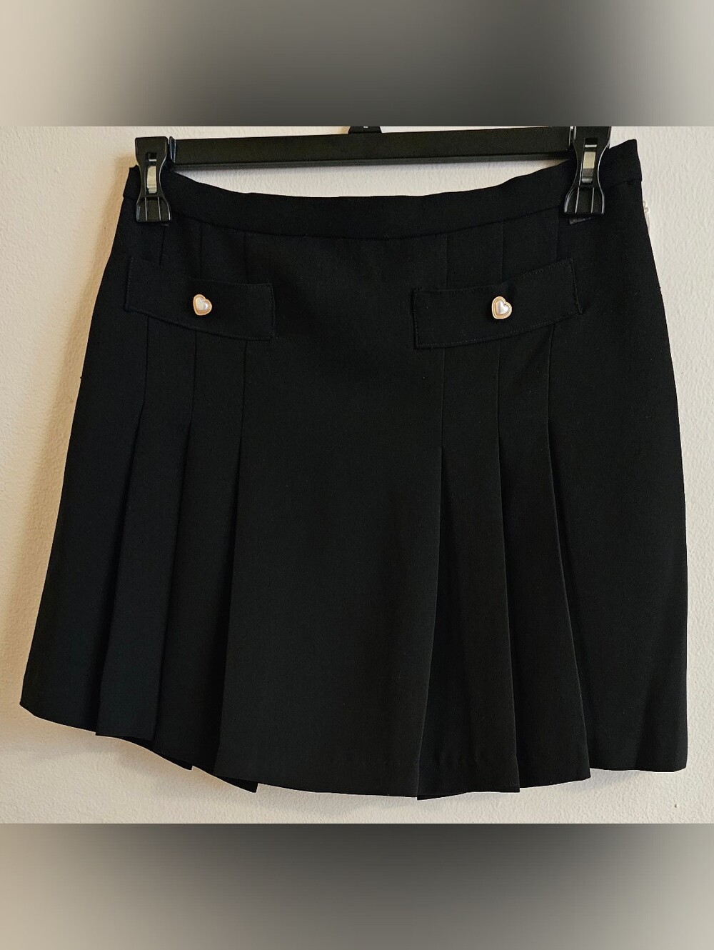CeCe Black Pleated Mini Skirt with Heart Buttons On Faux Pockets.